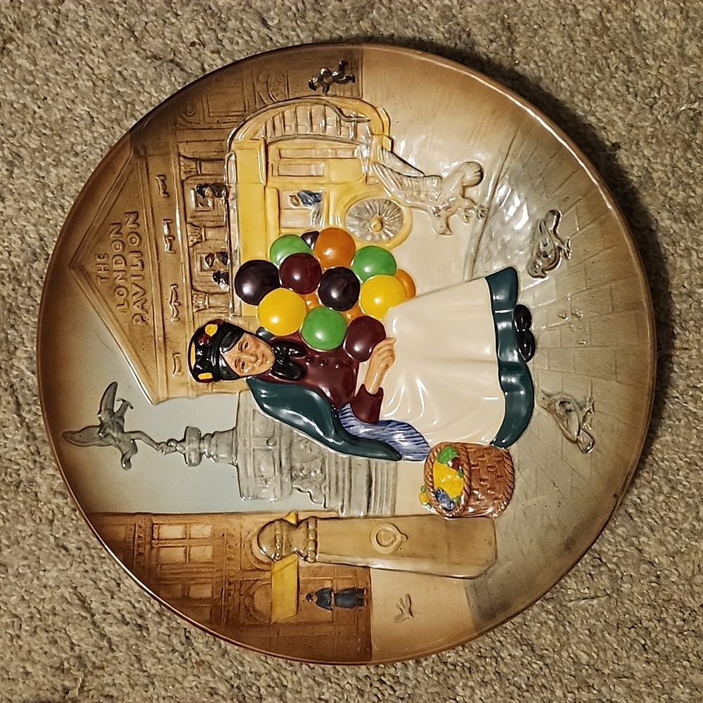 The Old Balloon Seller plate by Royal Doulton